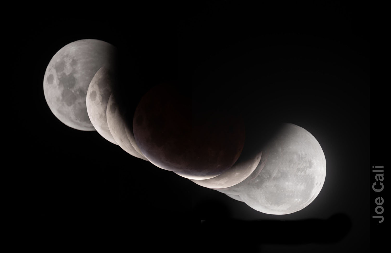 An image of a lunar eclipse with many phases of the moon