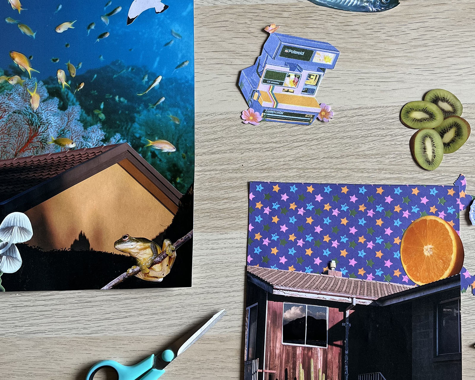 An image of photographic collages on a table surrounded by scissors and cut out images